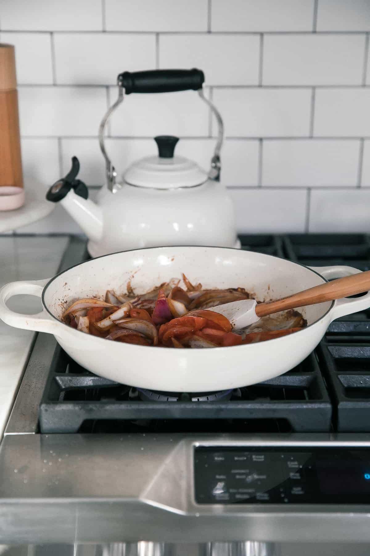 Sauteed ingredients in a pan. 