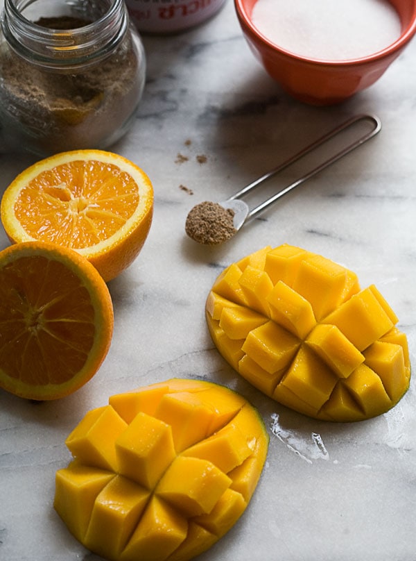 Mango Cardamom and Sweet Coconut Popsicles  www.acozykitchen.com