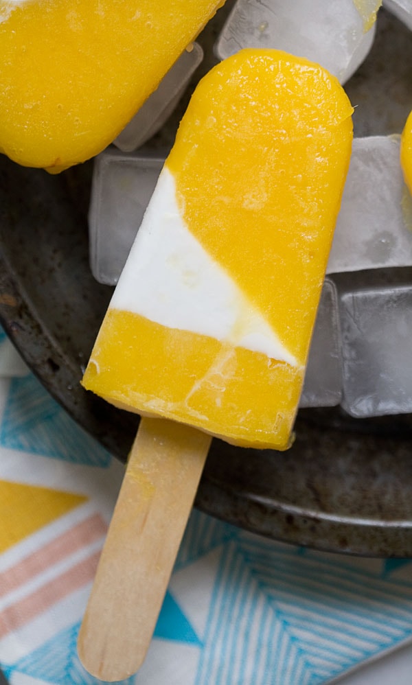 Mango Cardamom and Sweet Coconut Popsicles  www.acozykitchen.com