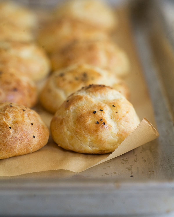 French Gougeres on a cutting board. 