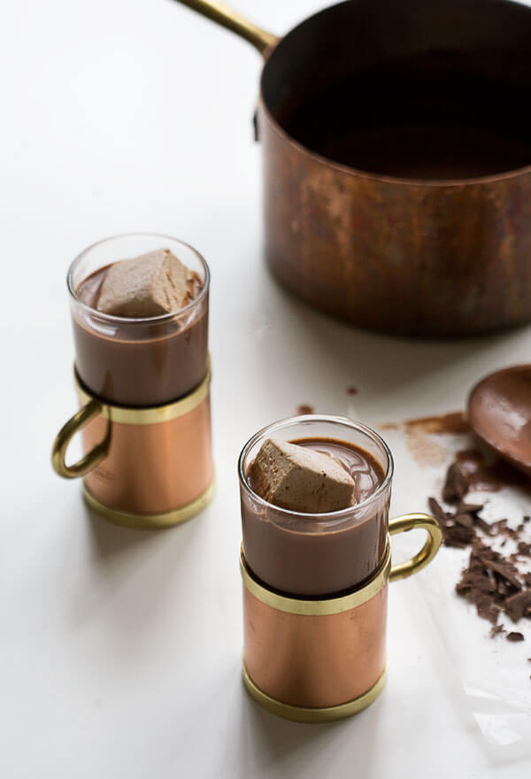 Mugs of Homemade Hot Chocolate with marshmallows on top. 