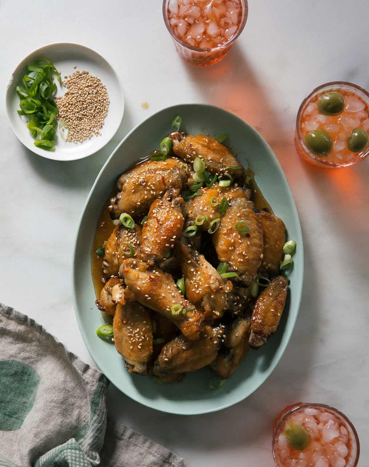 Hot Honey Lime Chicken on an oval green plate