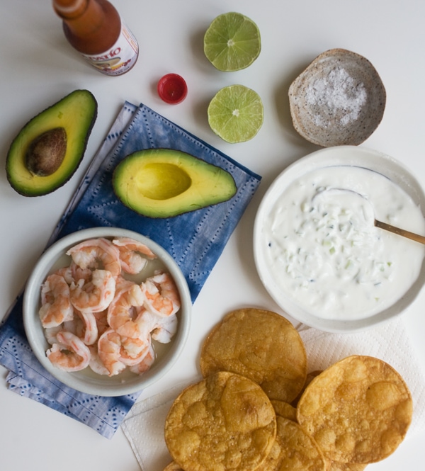 Tostada ingredients on a table.