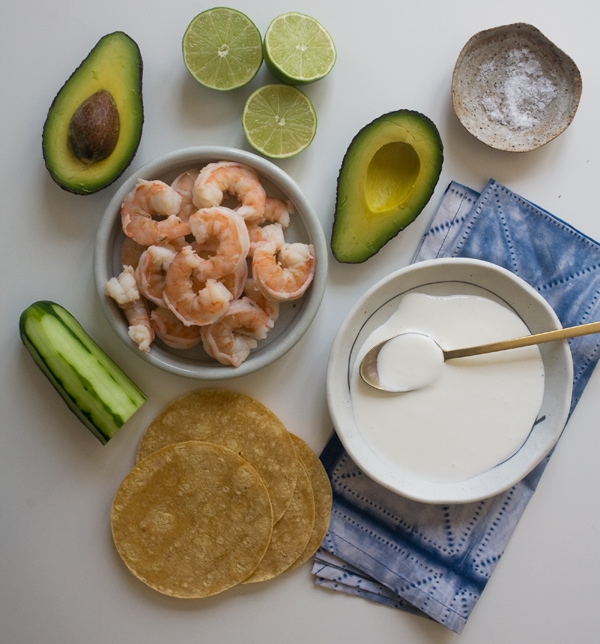 Ingredients for seafood tostadas on a plate.