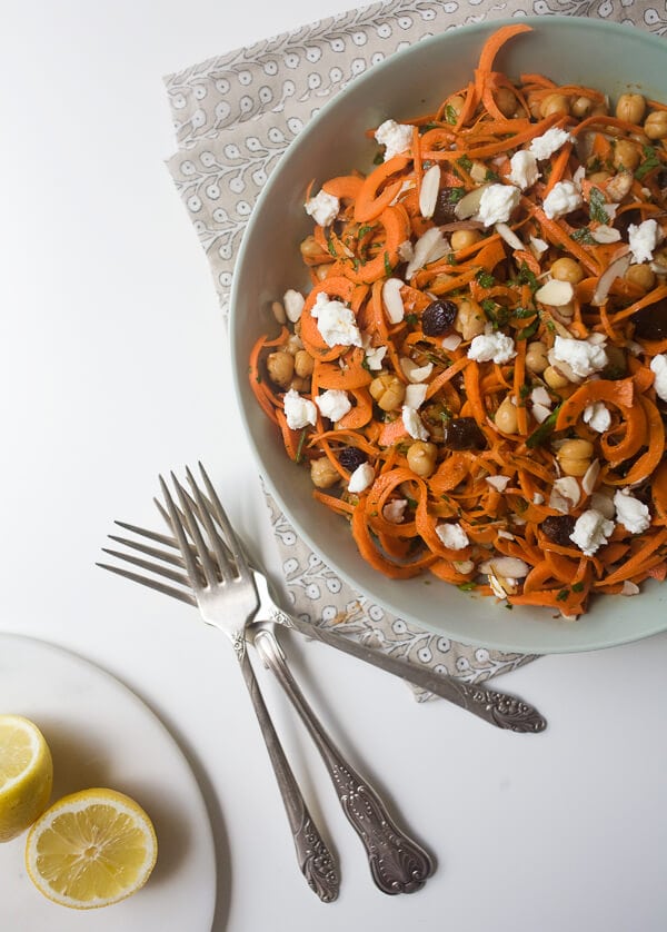 Moroccan Carrot Noodle Salad with Golden Raisins, Harissa and Goat Cheese