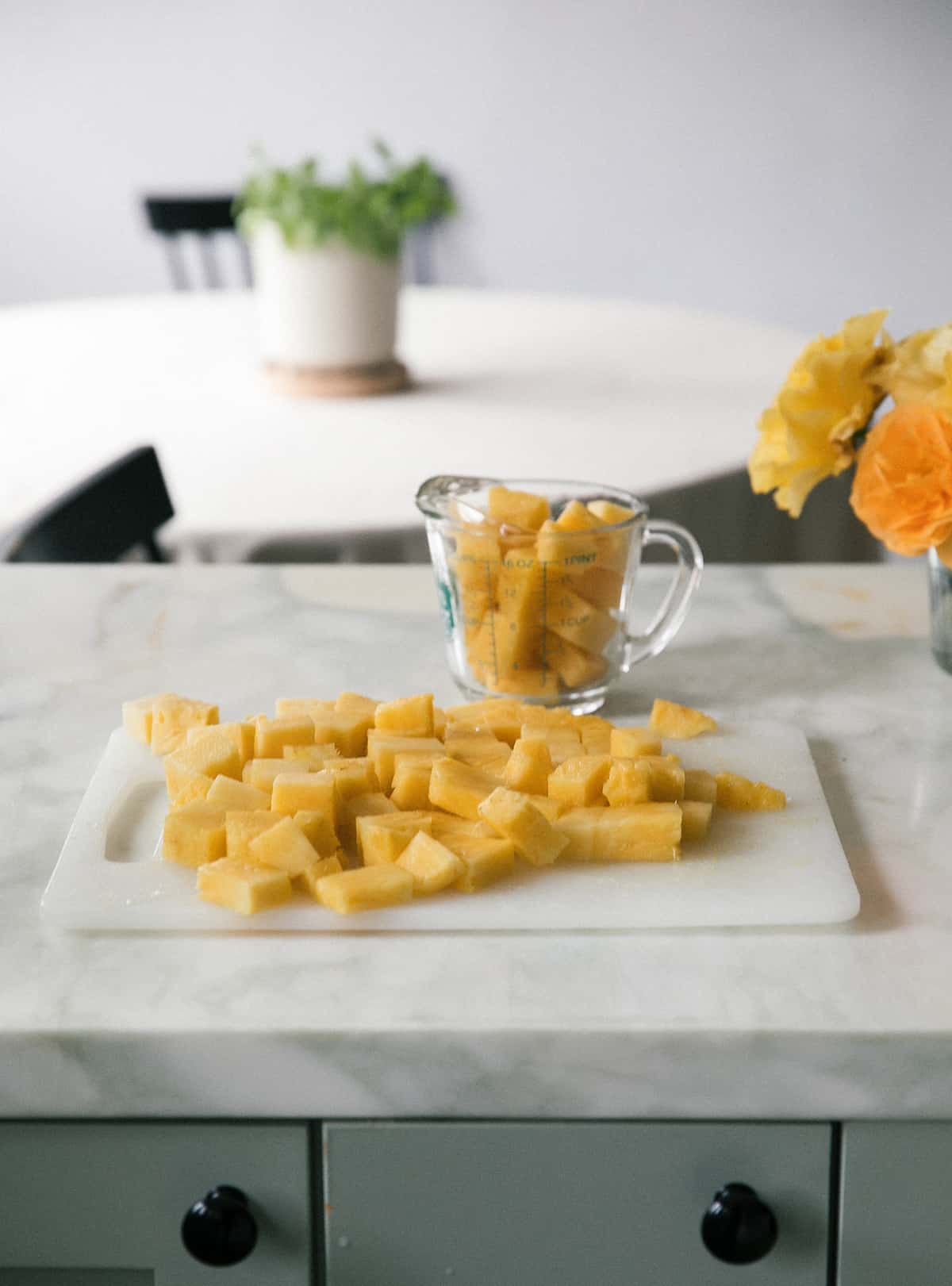 Frozen pineapple on a cutting board