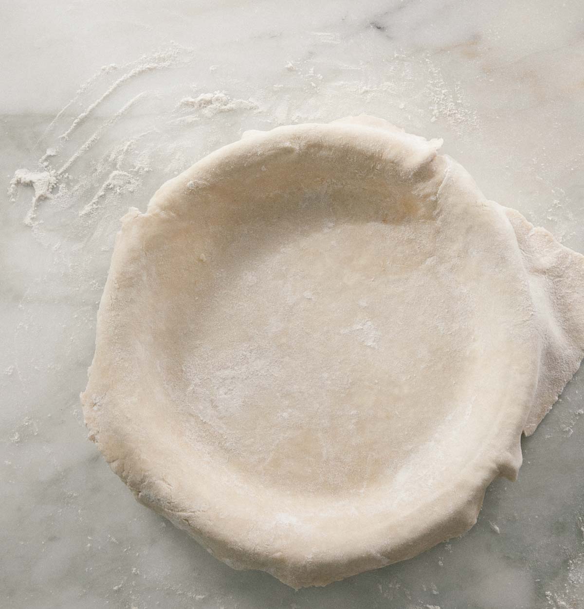Pie crust in a pie pan. 