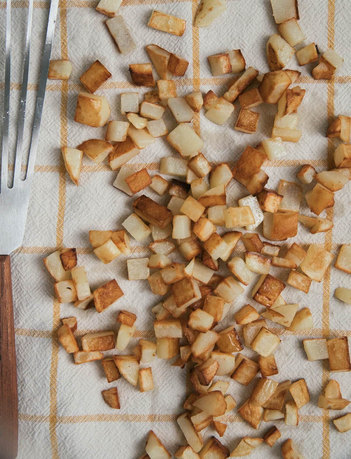 Fried diced potato on cloth. 