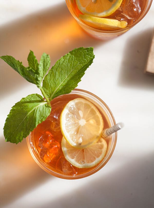 Sweet Tea Recipe in glasses with the pitcher. 