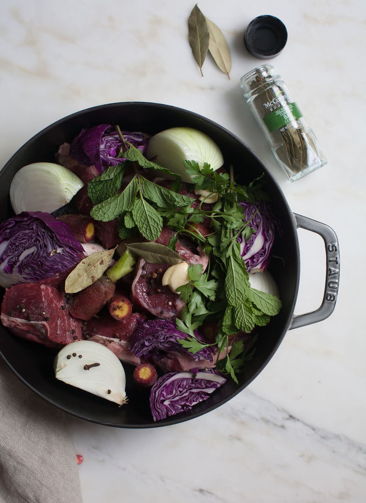 Beef about to get braised with mint and cabbage. 