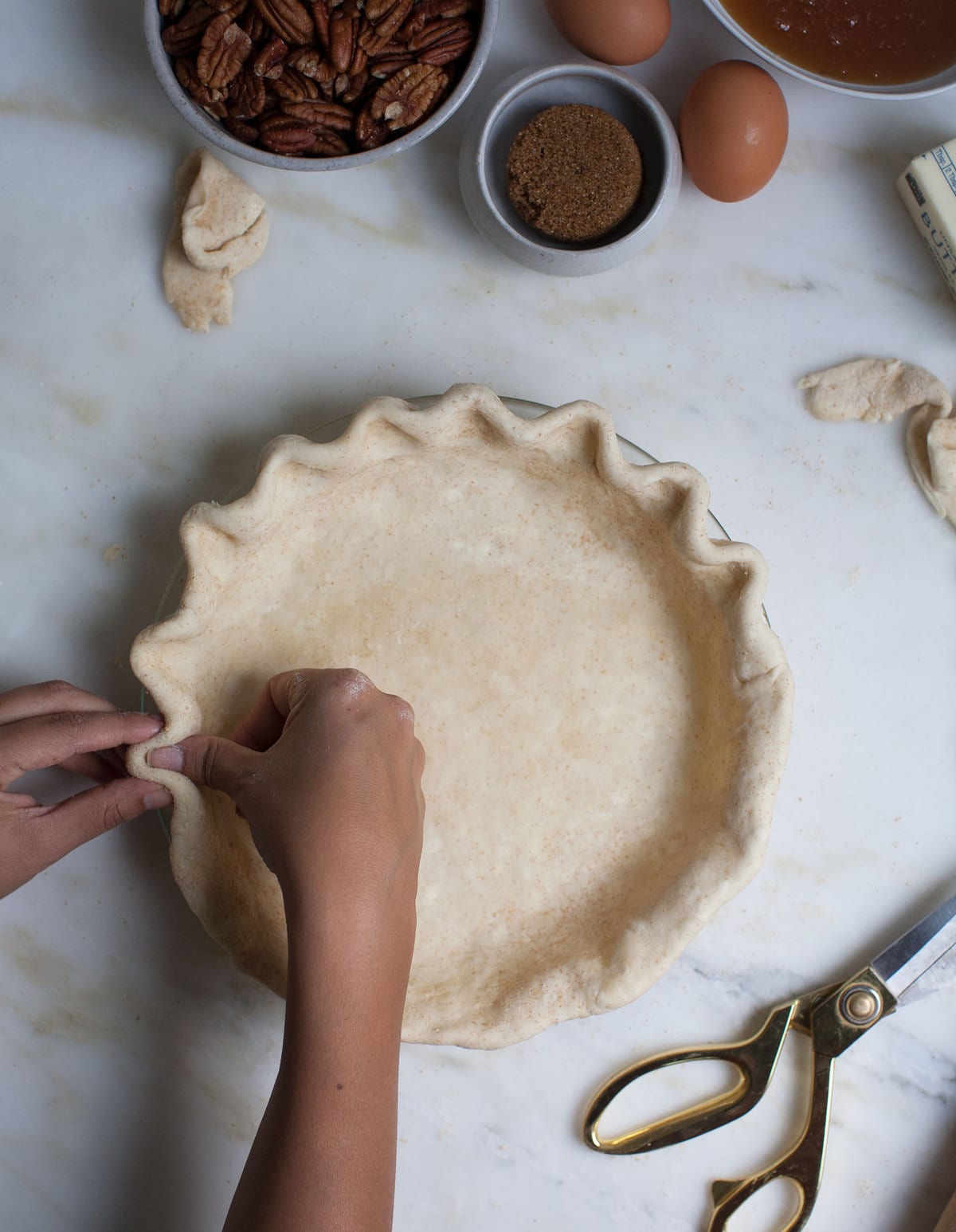 Crimping pie crust. 