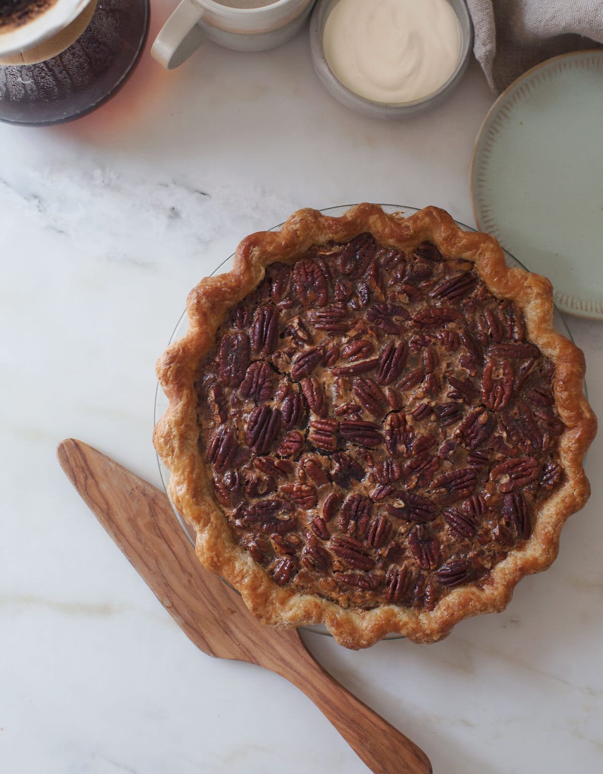 Black Bottom Pecan Pie with plates. 