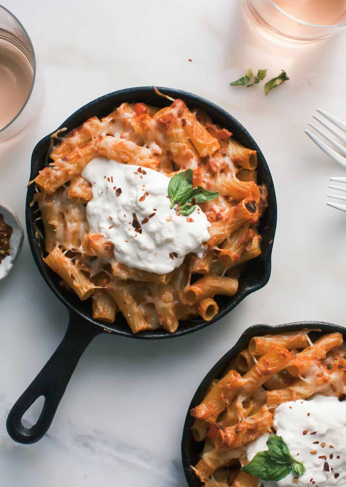 Baked Ziti in mini cast iron skillets.