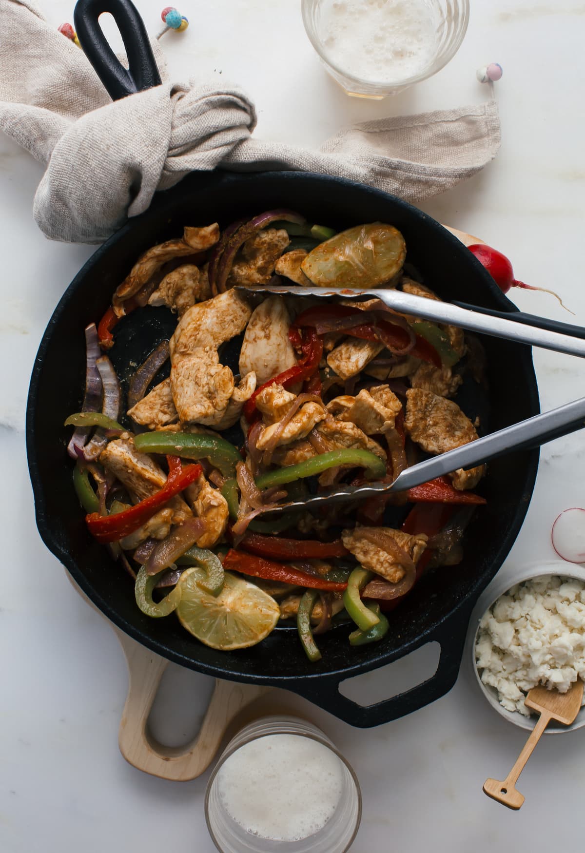 Cooked fajitas filling on a skillet.