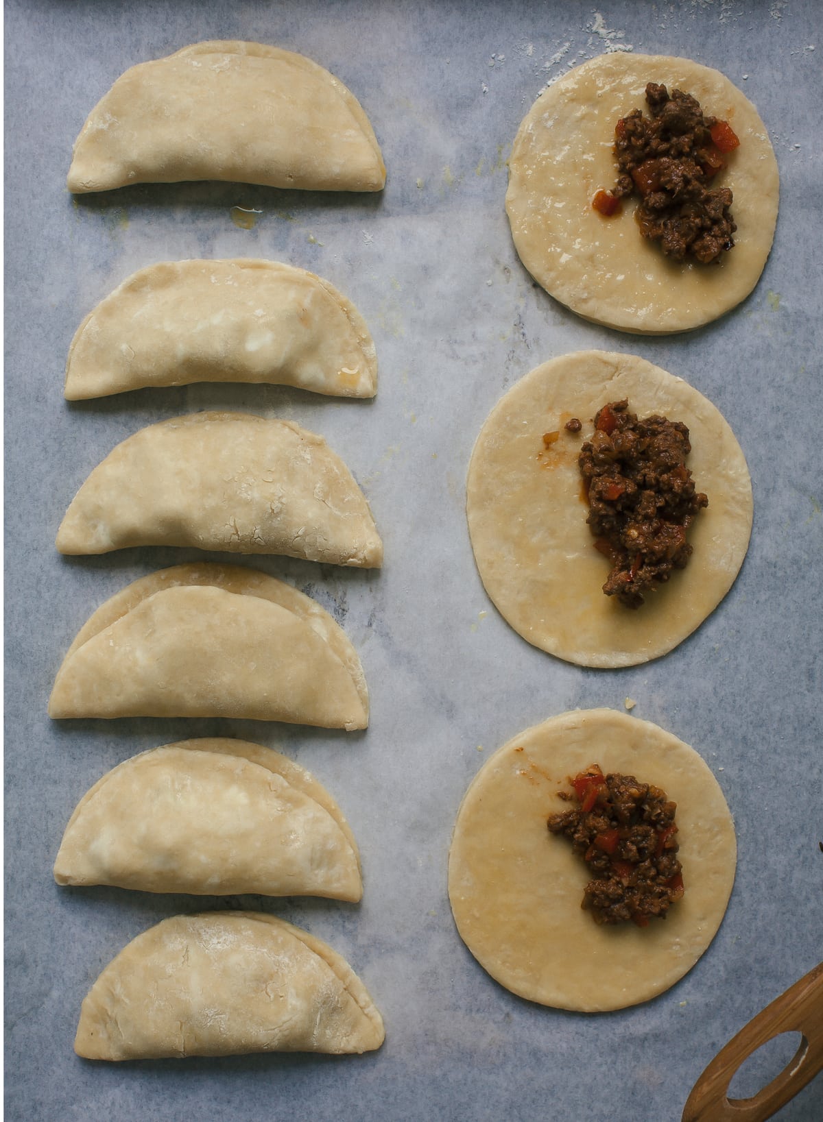 Beef Empanadas being assembled. 