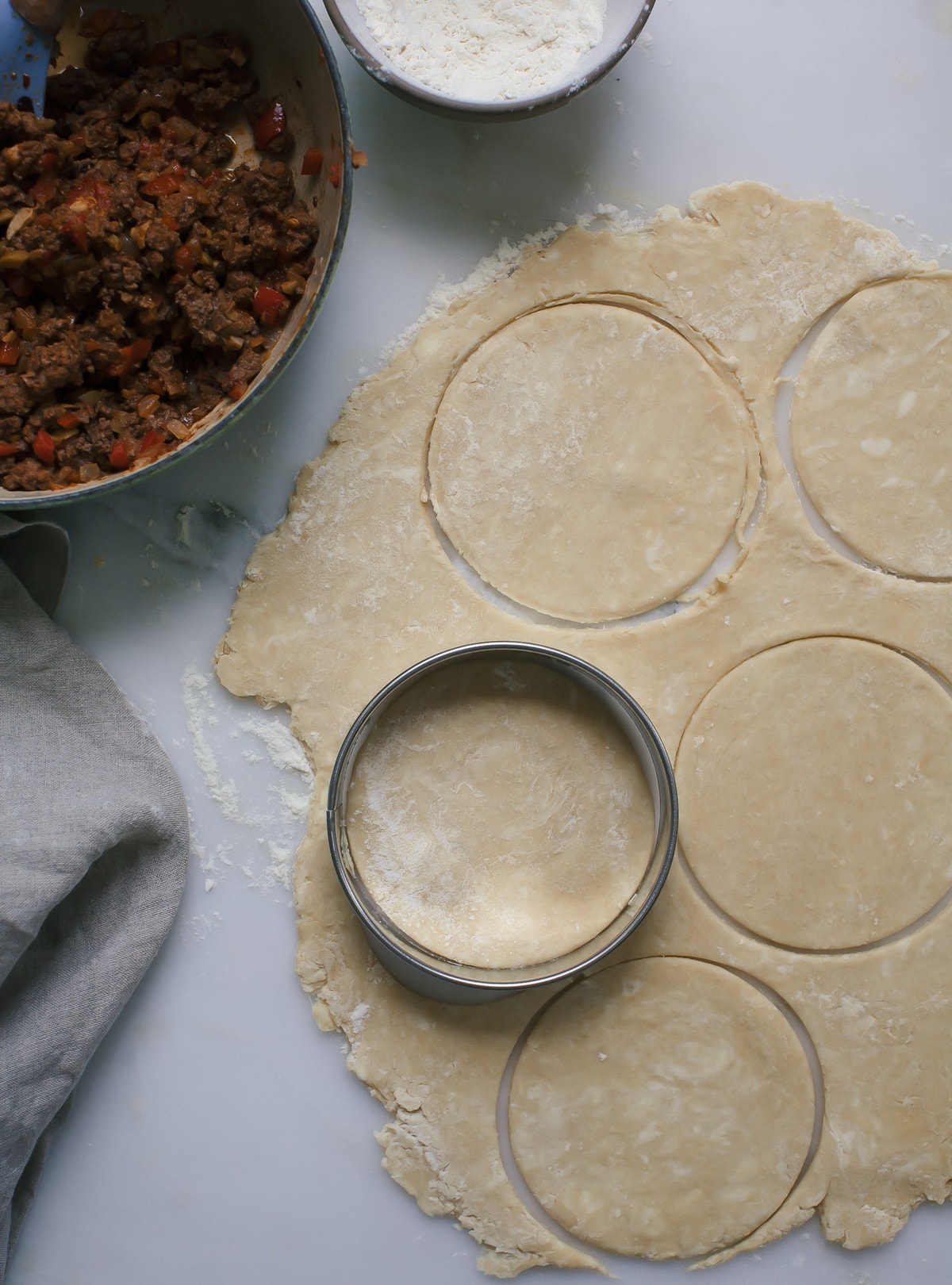 Beef Empanadas being cut out. 