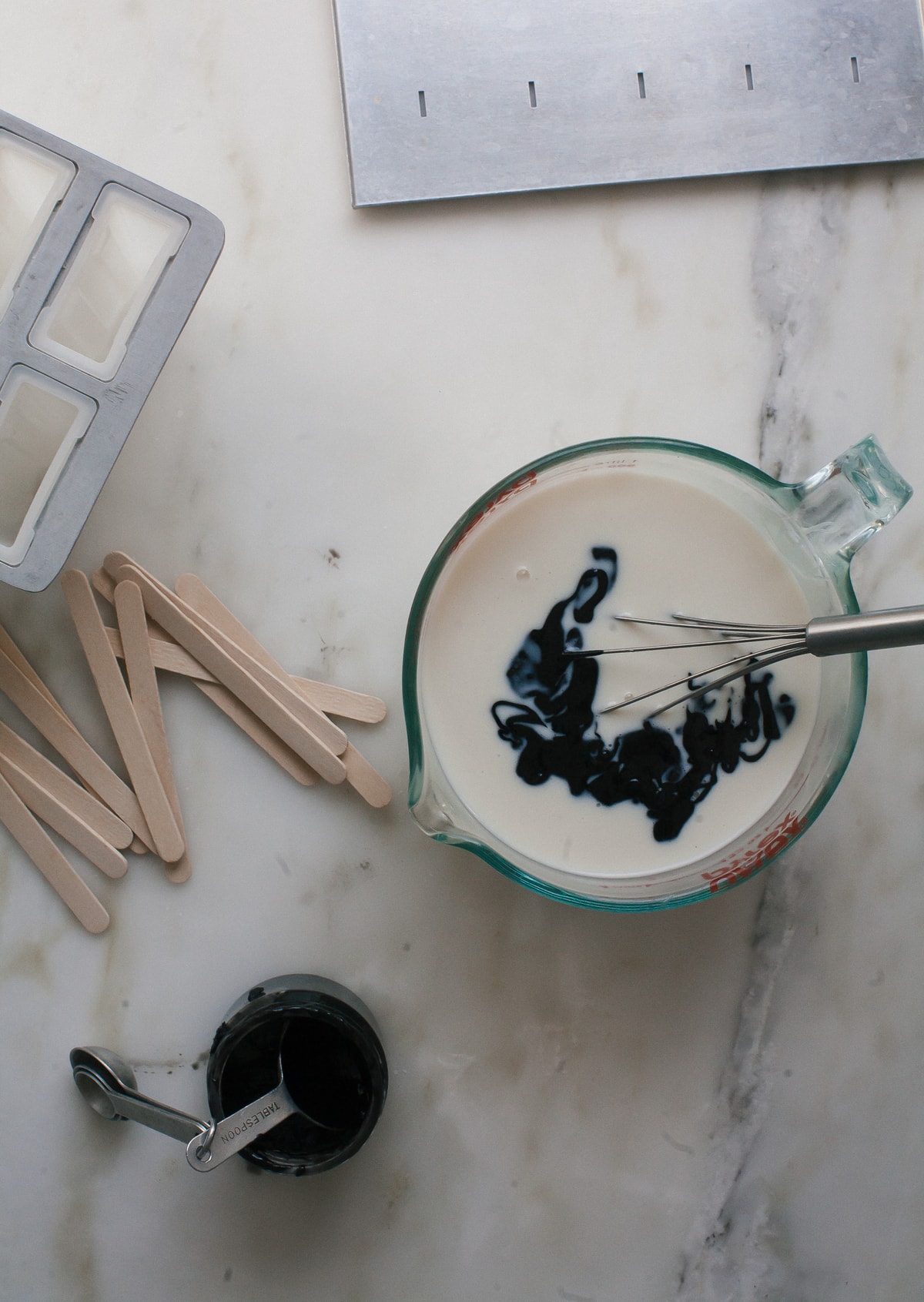 Popsicle ingredients in a measuring cup.