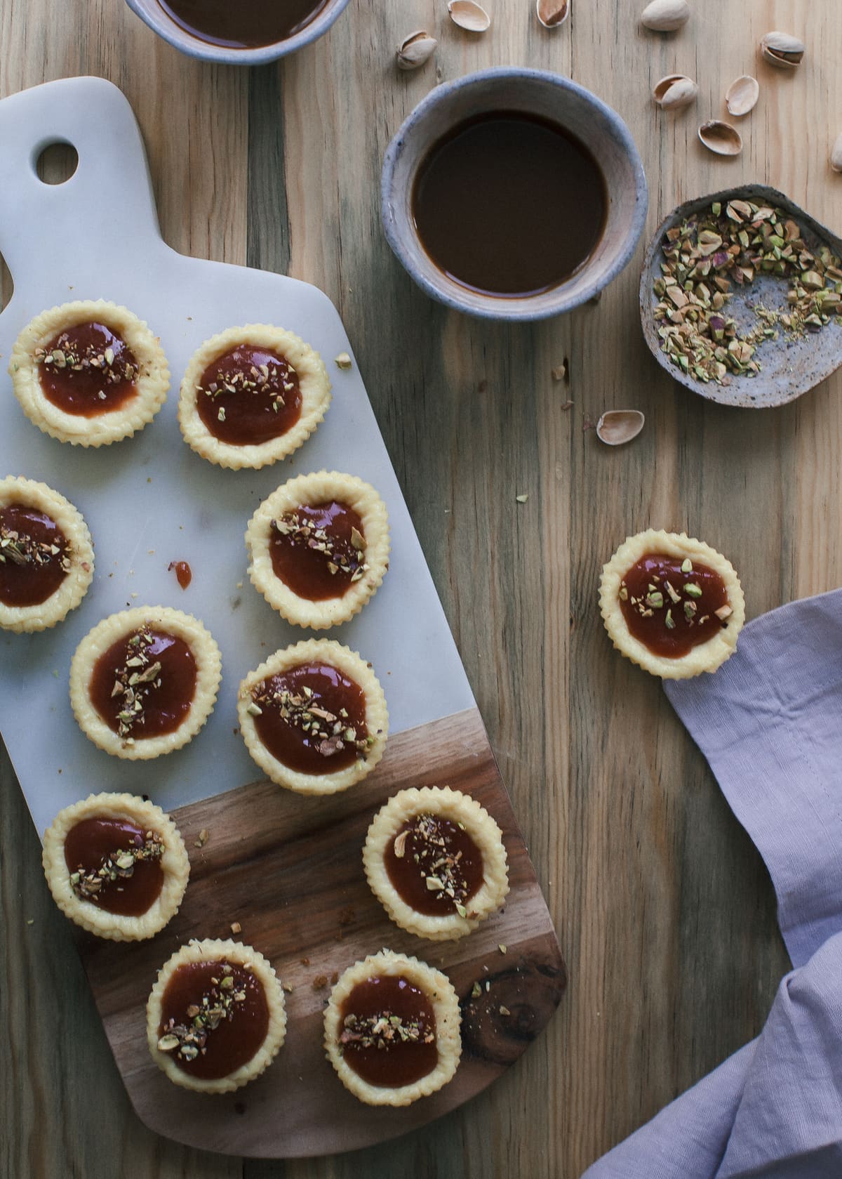 Mini Cheesecakes with Guava Glaze and Pistachios