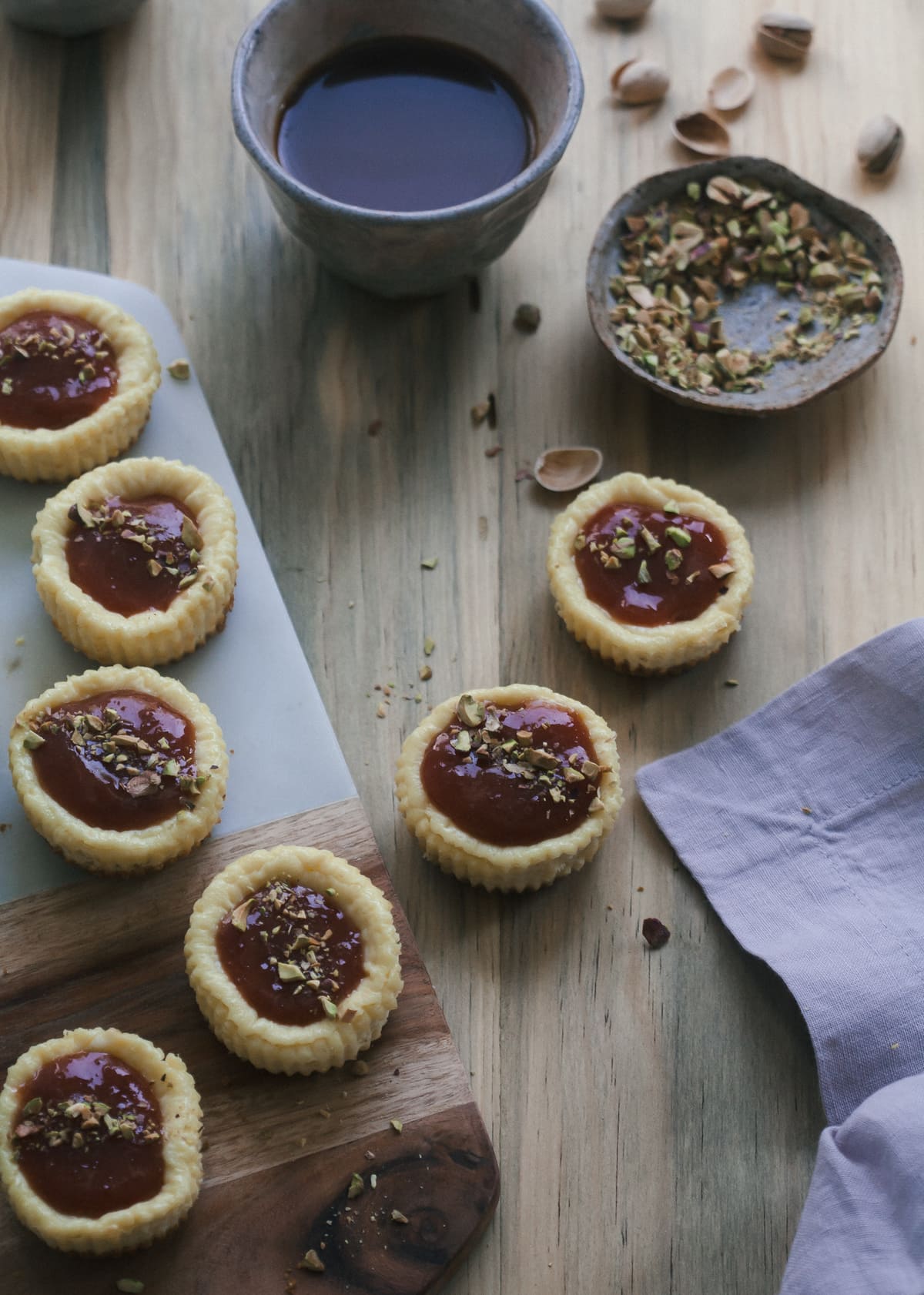 Mini Cheesecakes with Guava Glaze and Pistachios