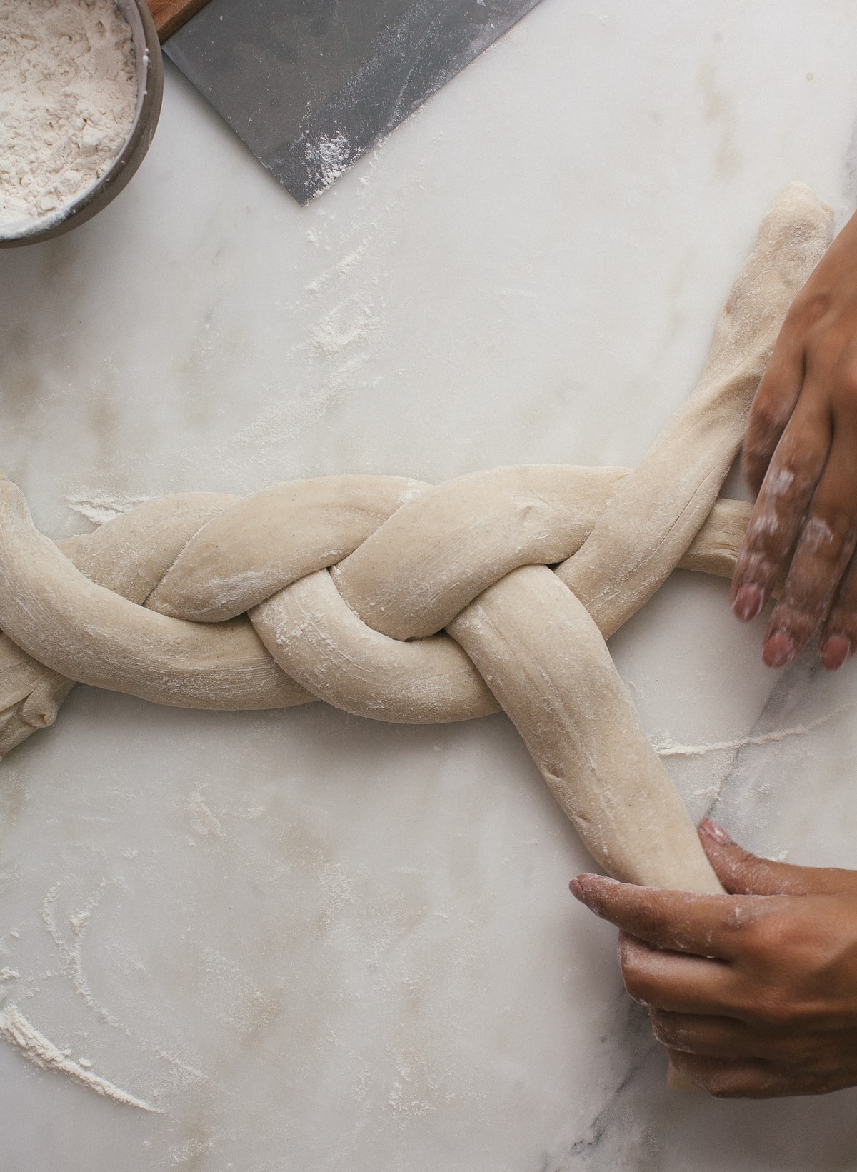 Braiding the dough. 