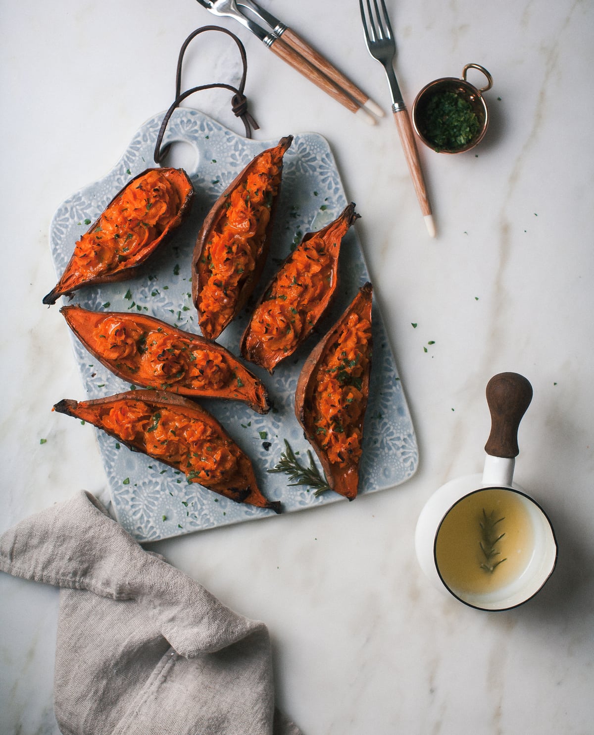 Double Baked Sweet Potato with Caramelized Onions + Comté + Rosemary Butter