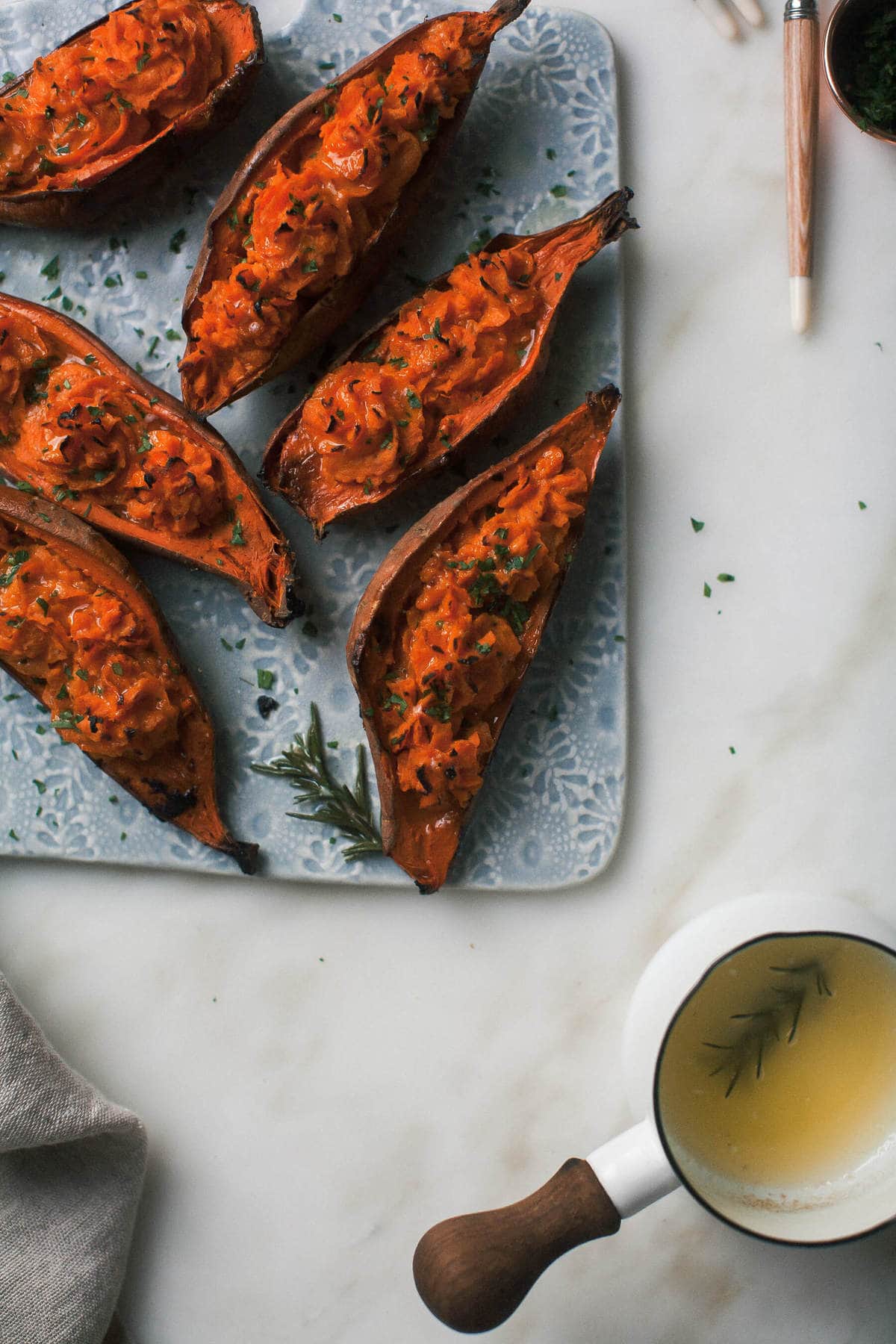 Double Baked Sweet Potato with Caramelized Onions + Comté + Rosemary Butter
