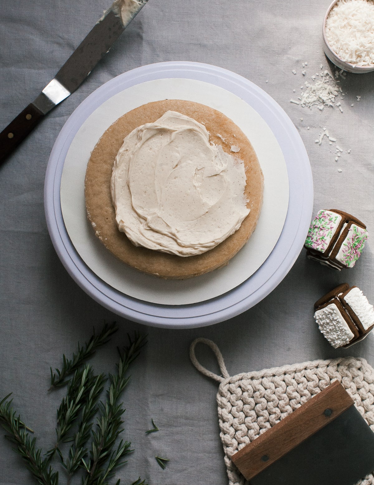 Overhead image of cake topped with frosting.