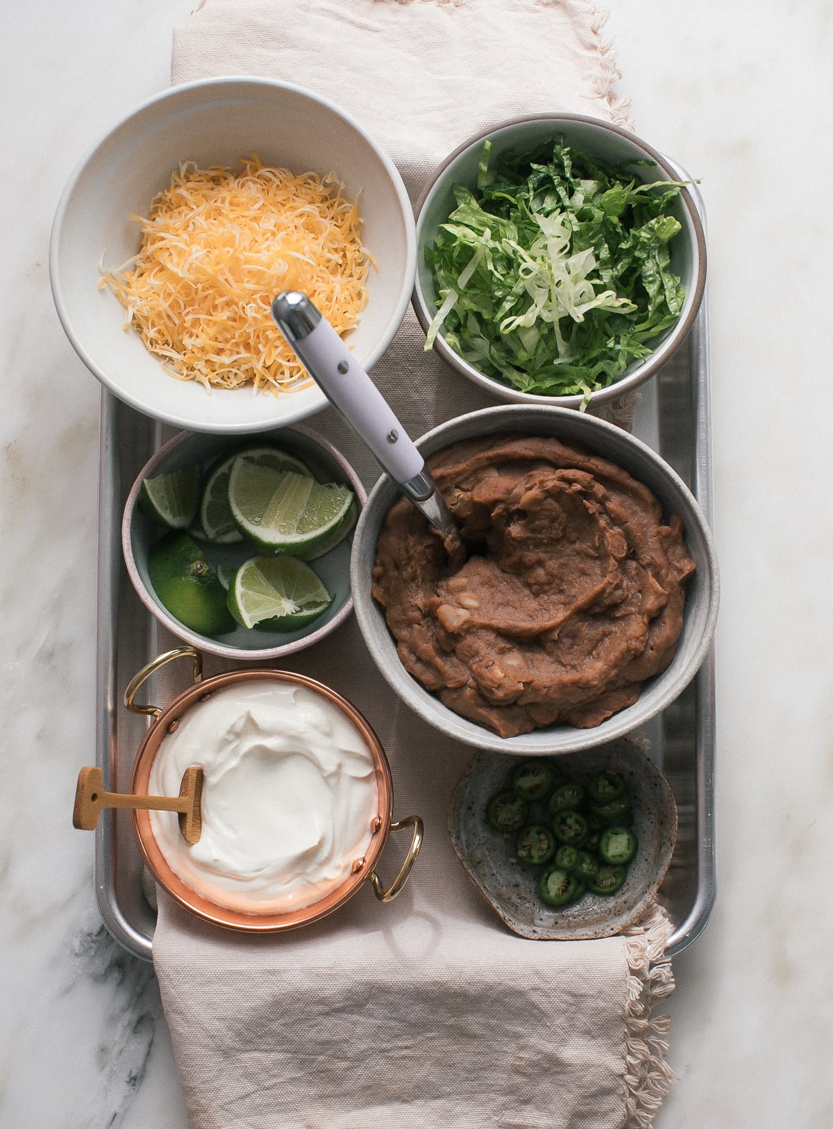 Ingredients for double decker tacos on a sheet pan.