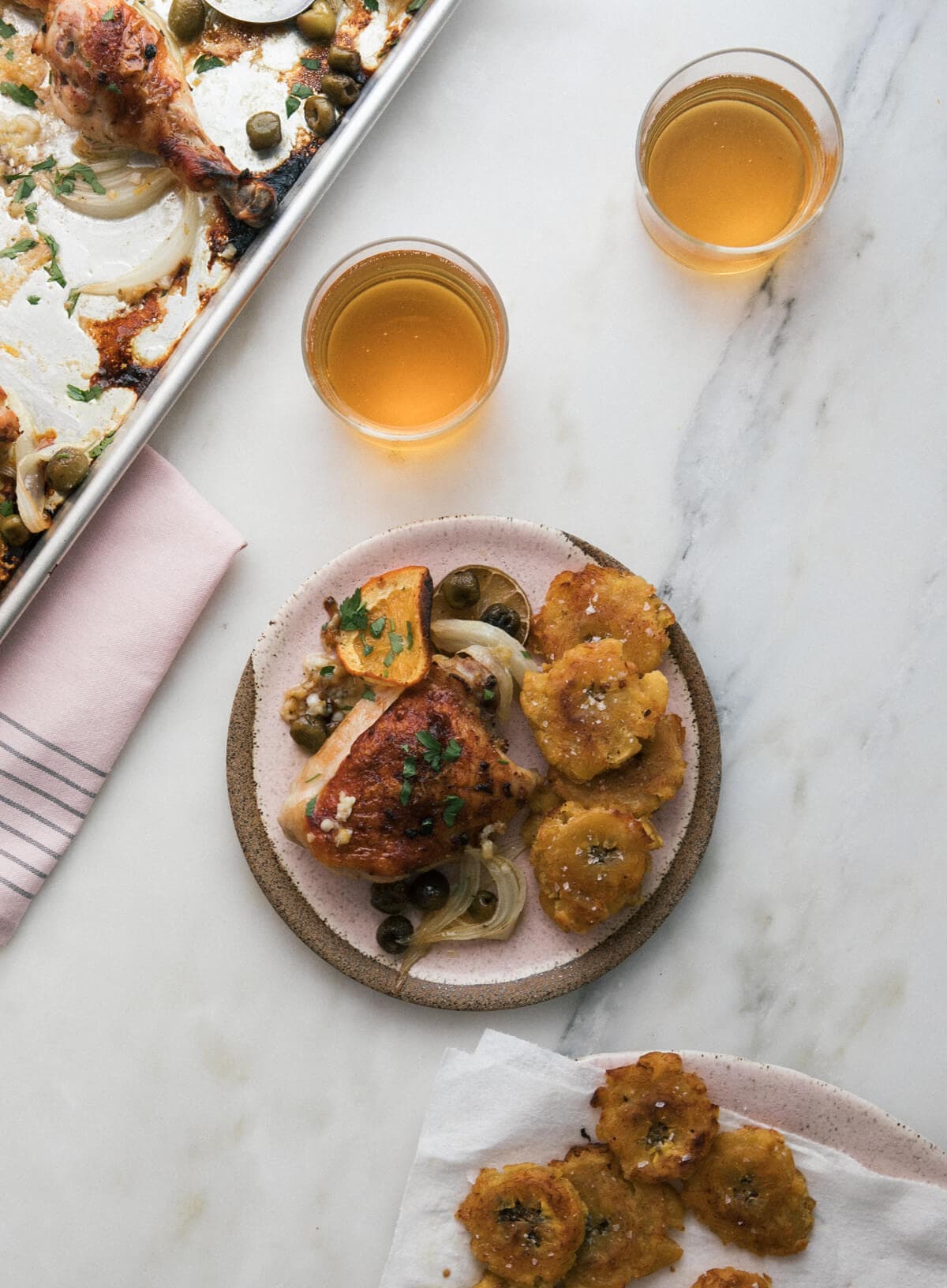 Overhead image of sheet pan chicken on a plate.