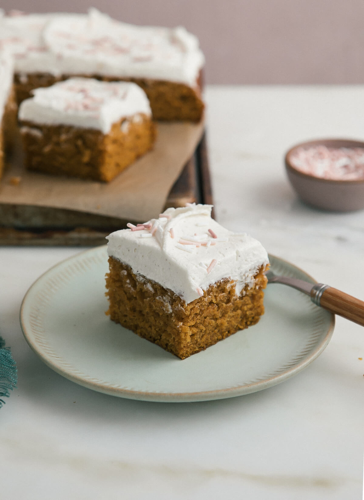 Slice of Pumpkin Sheet Cake with Brown Butter Frosting