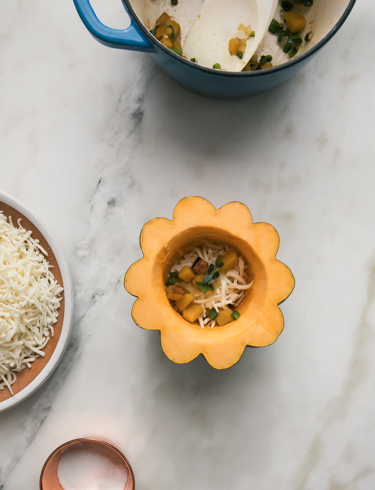 Acorn squash filled with squash and cheese.