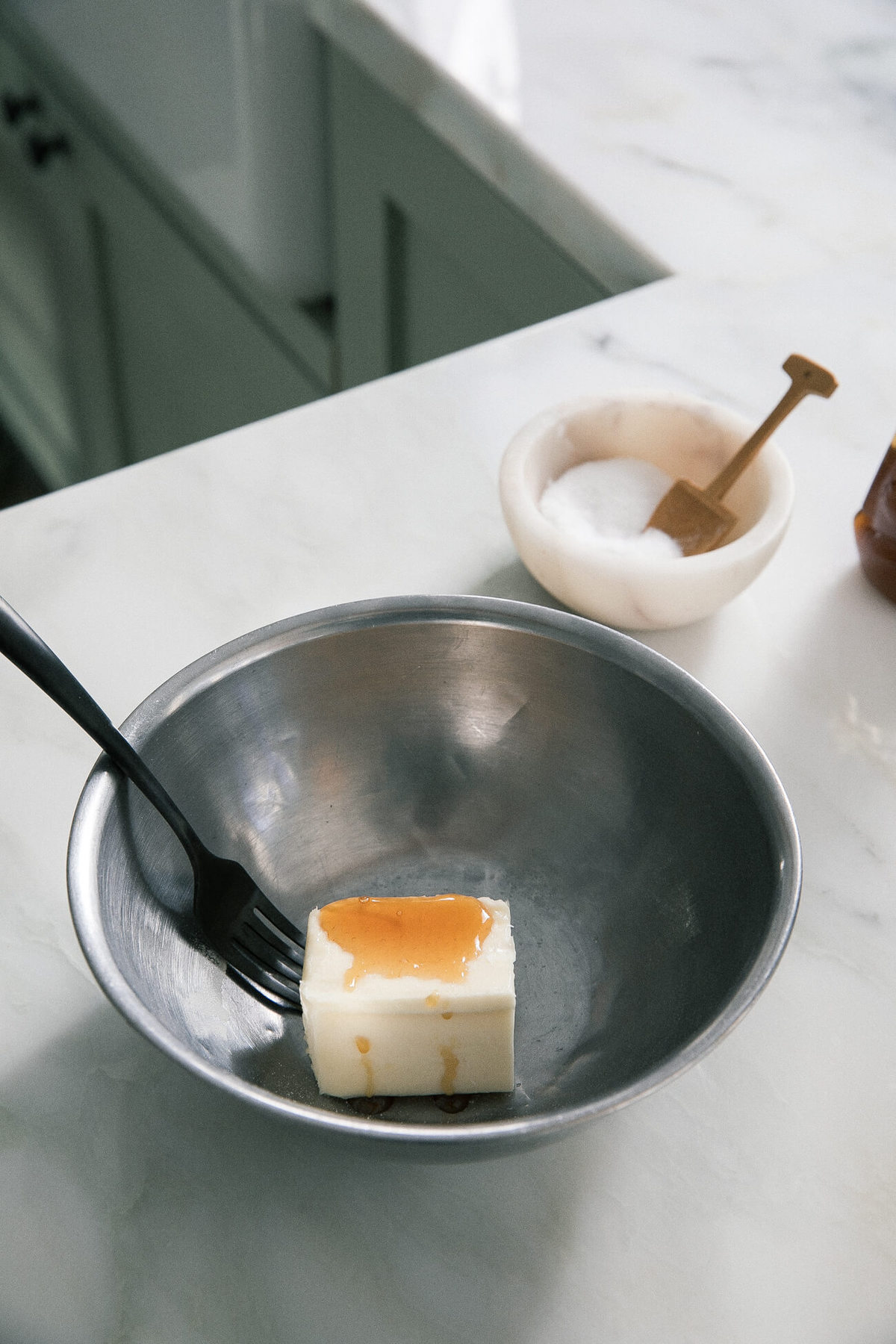 Butter in a small bowl with honey.