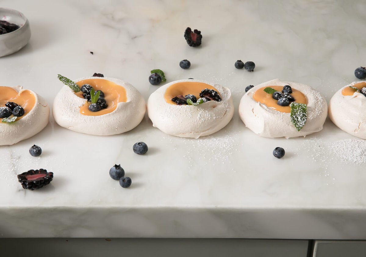 Meringues with Citrus Curd on counter. 