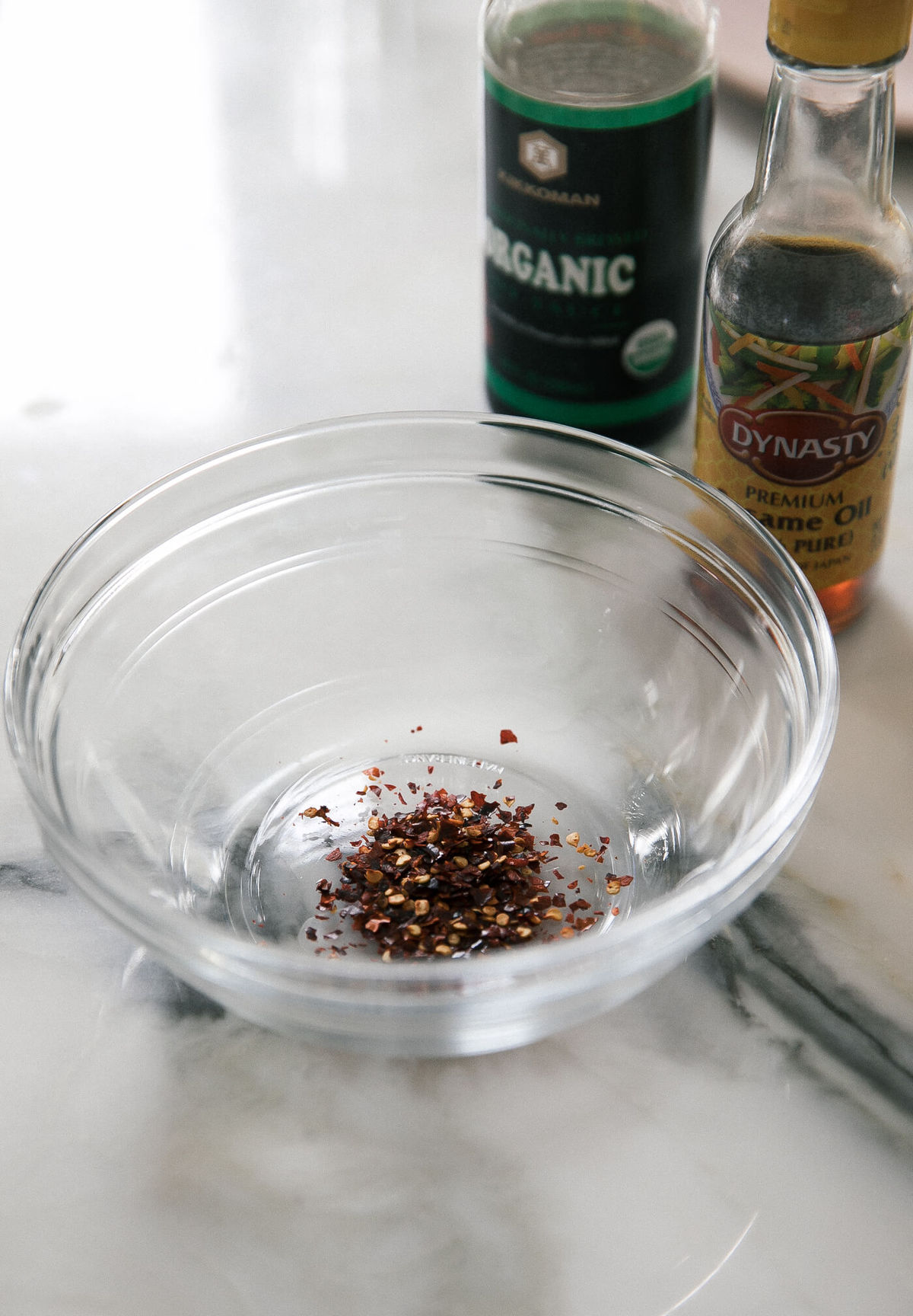 Red crushed pepper in a small bowl.