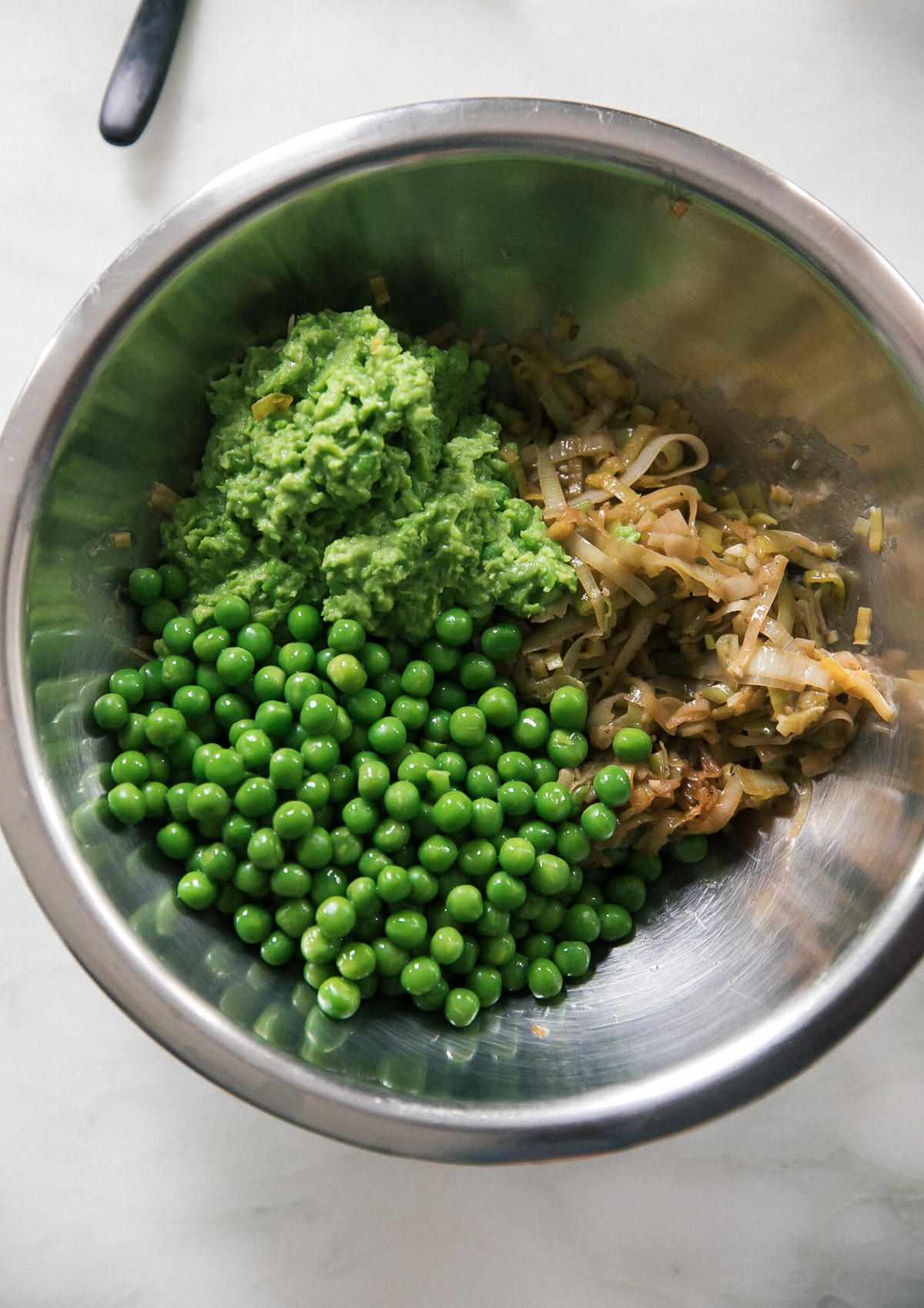 Dumpling filling ingredients in a mixing bowl. 