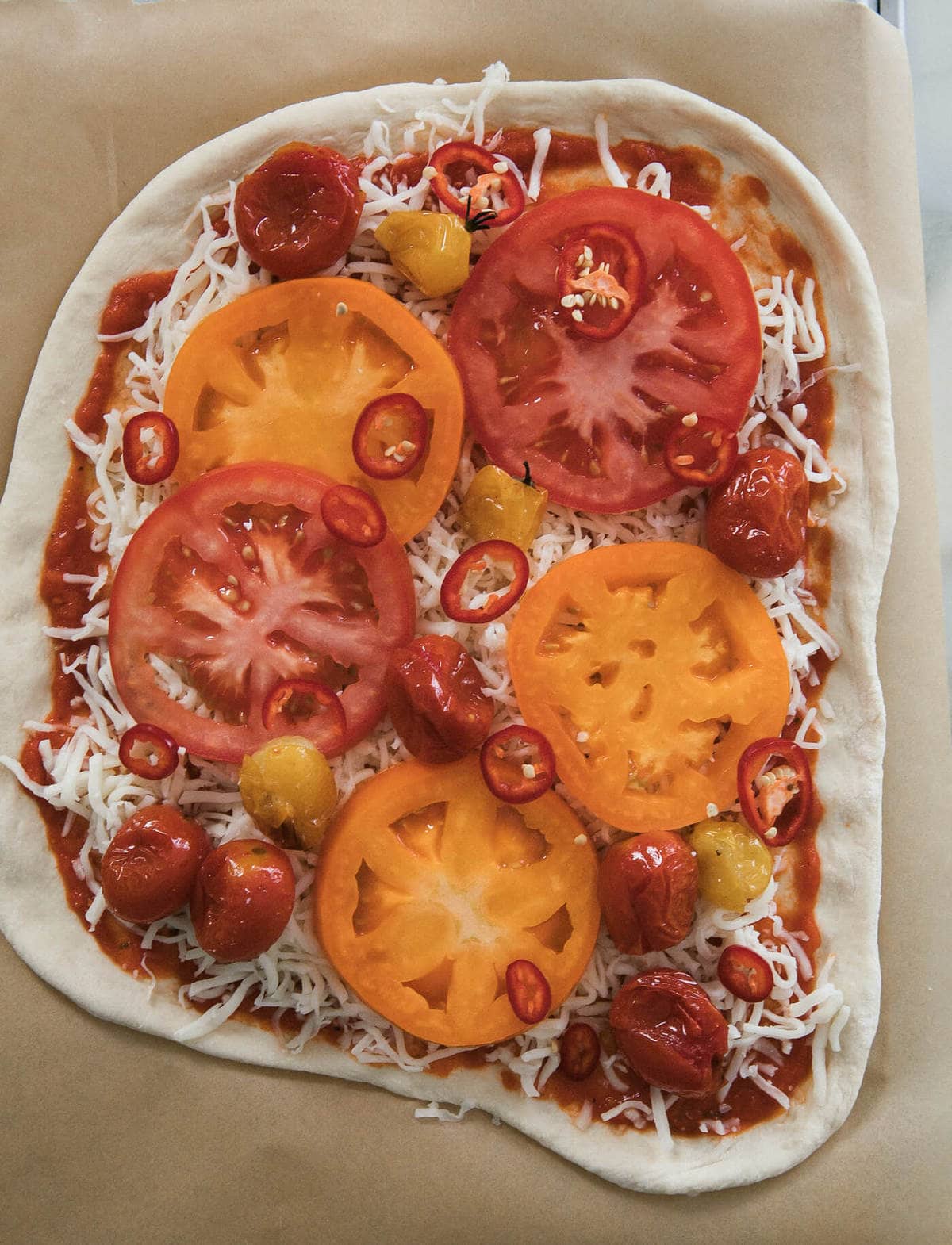 Pizza assembled, pre-bake. 