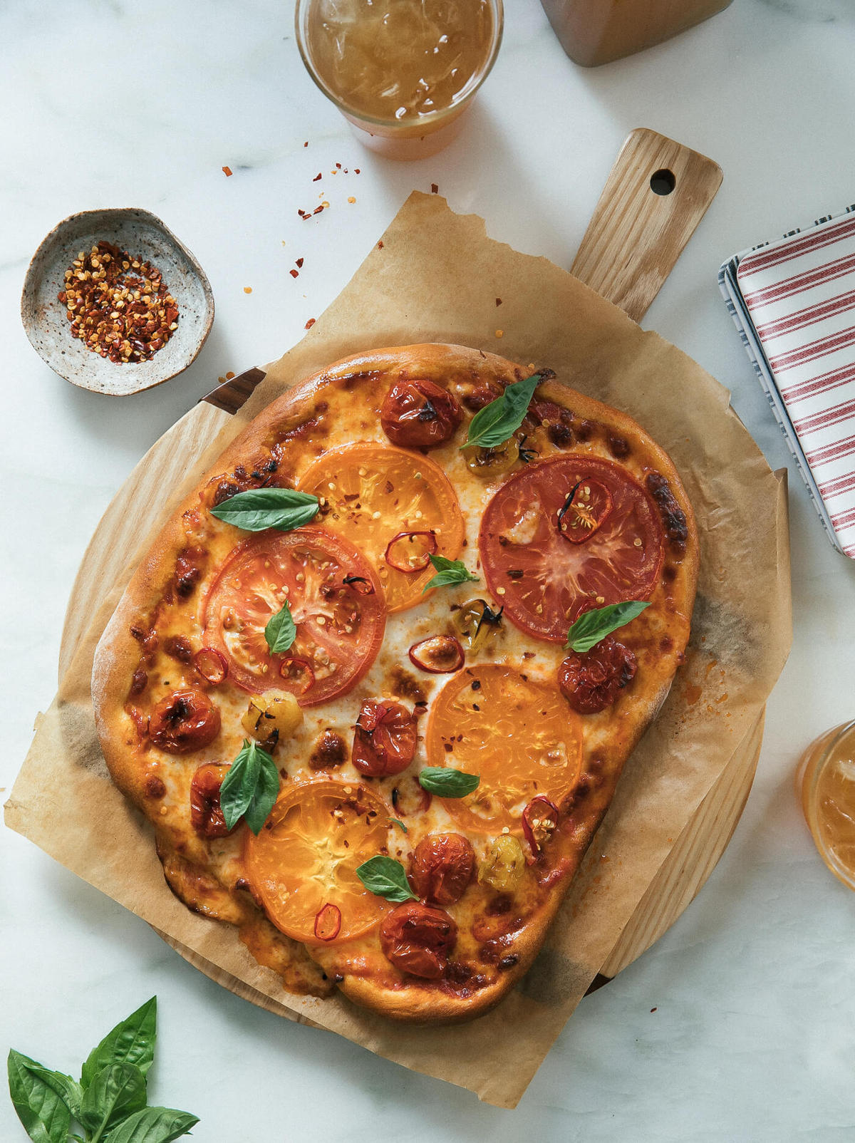 Heirloom Tomato Pizza with basil on top. 