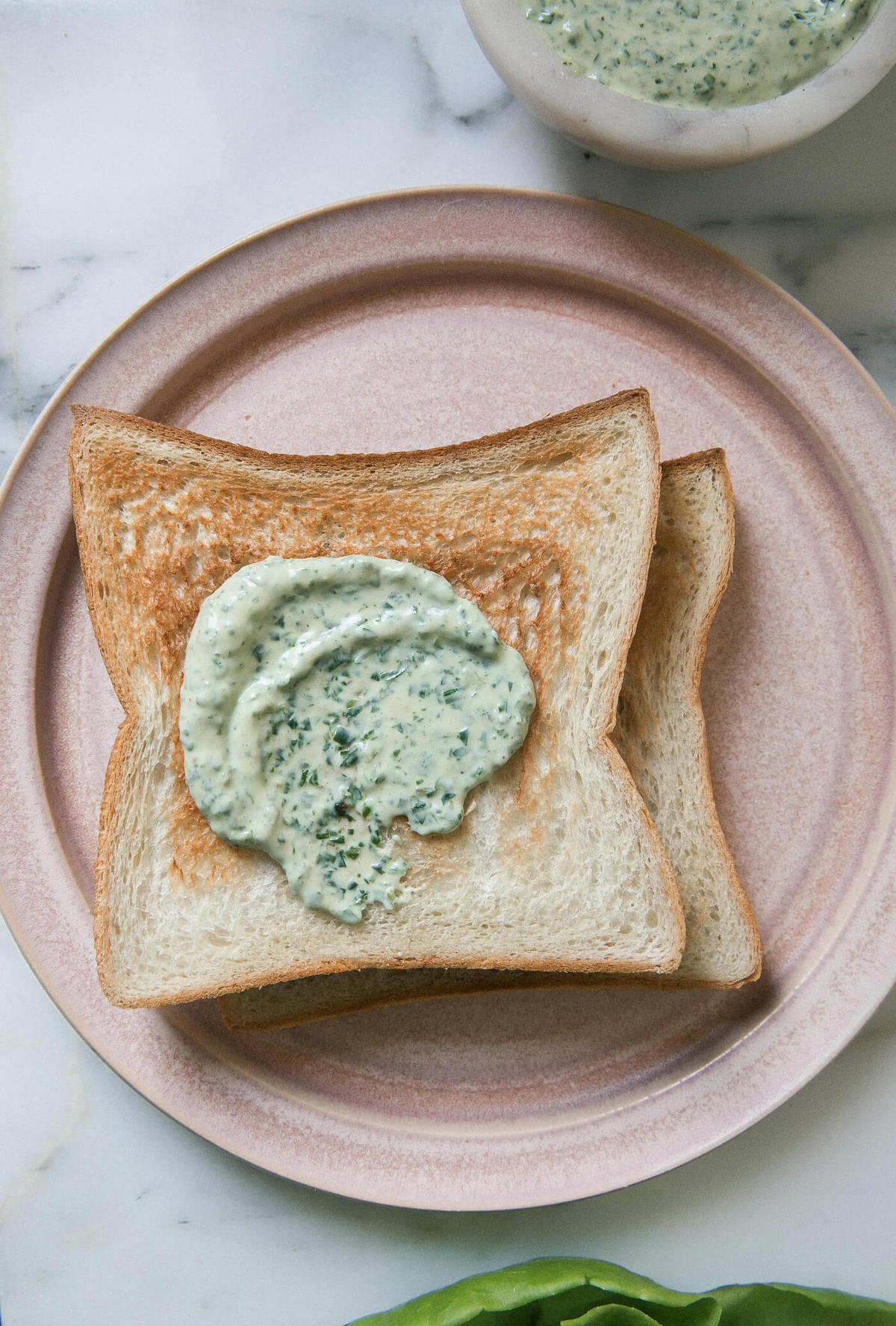 Green goddess mayo on bread. 