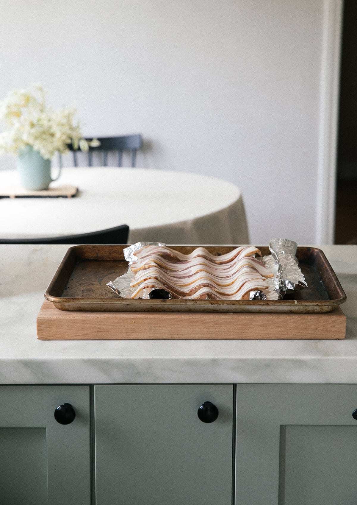 Bacon on a baking sheet with foil. 