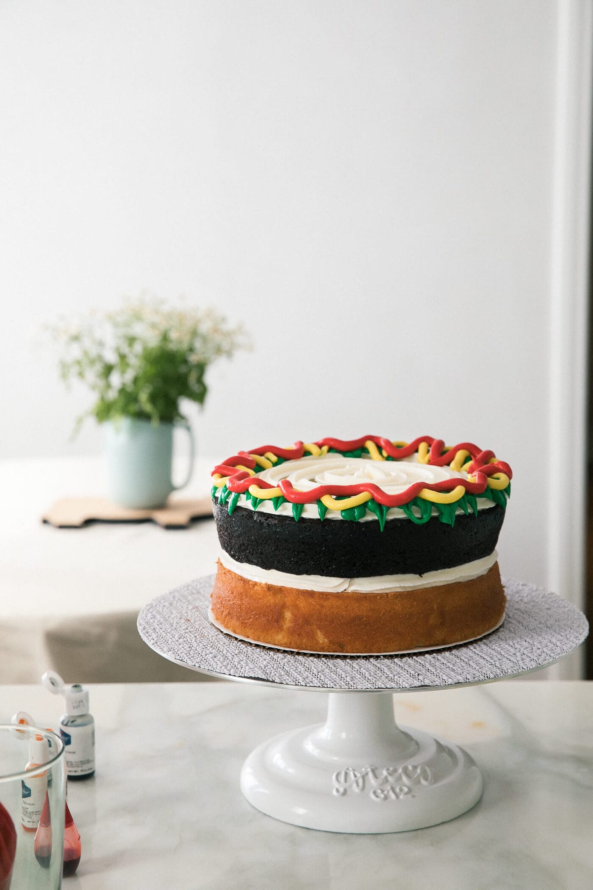 Decorated cake on a counter.