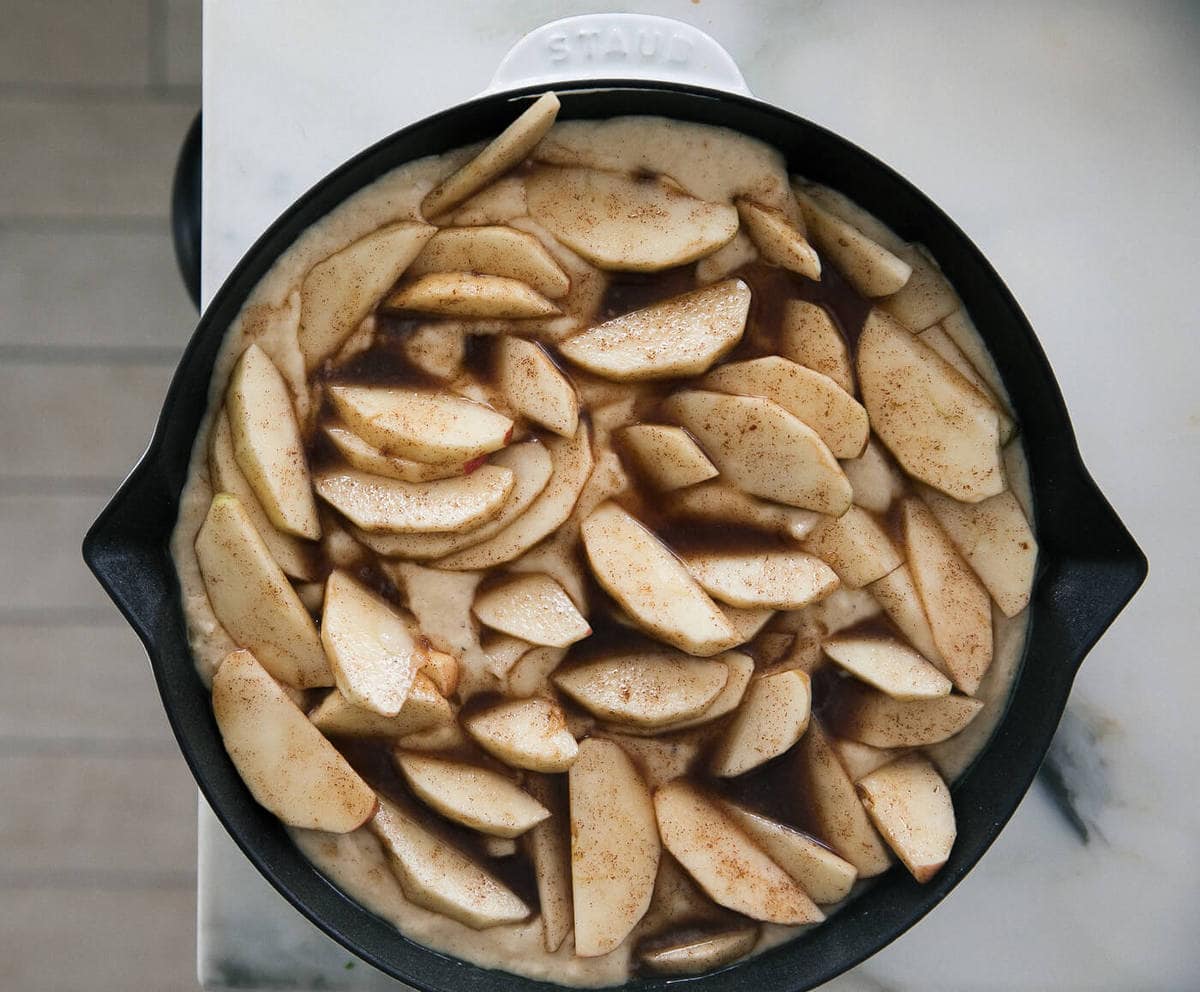 Chai Apple Skillet Cake in a pan before it bakes. 