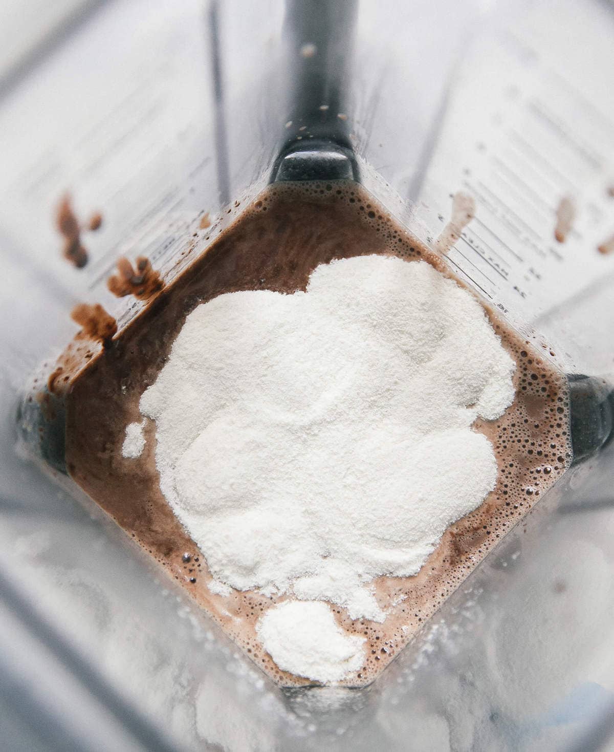 Oat Milk Hot Chocolate with collagen creamer in a blender.