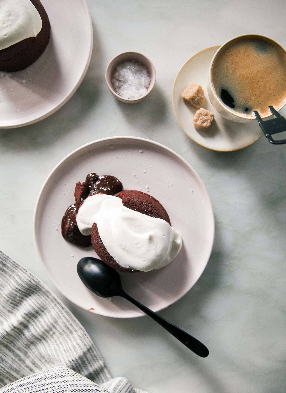 Red Velvet Lava Cakes with coffee and sugar on the side. 