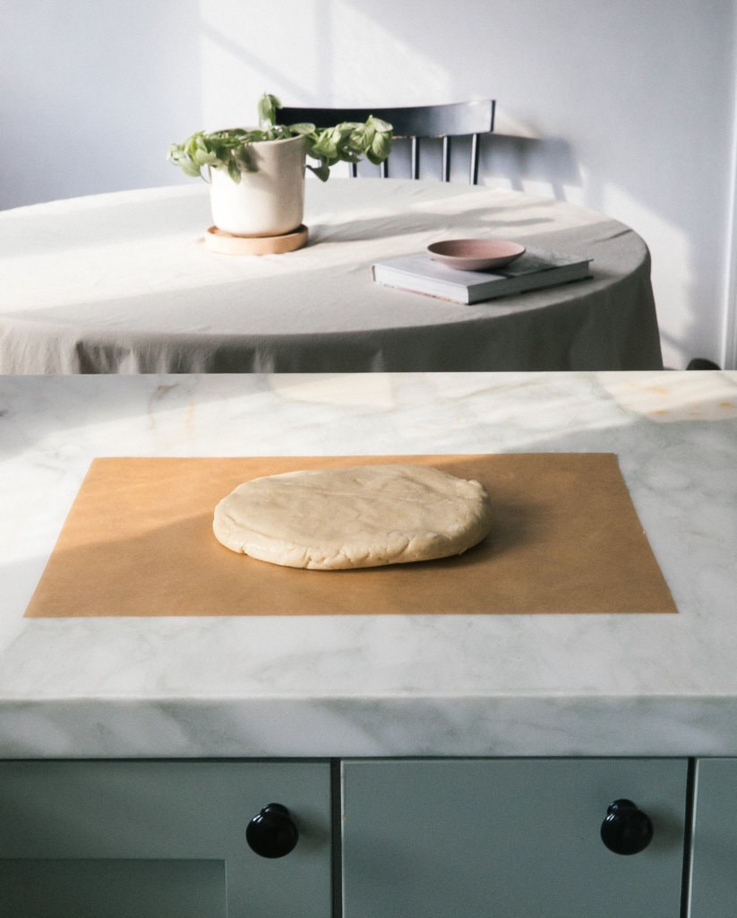 Dough on a piece of parchment. 