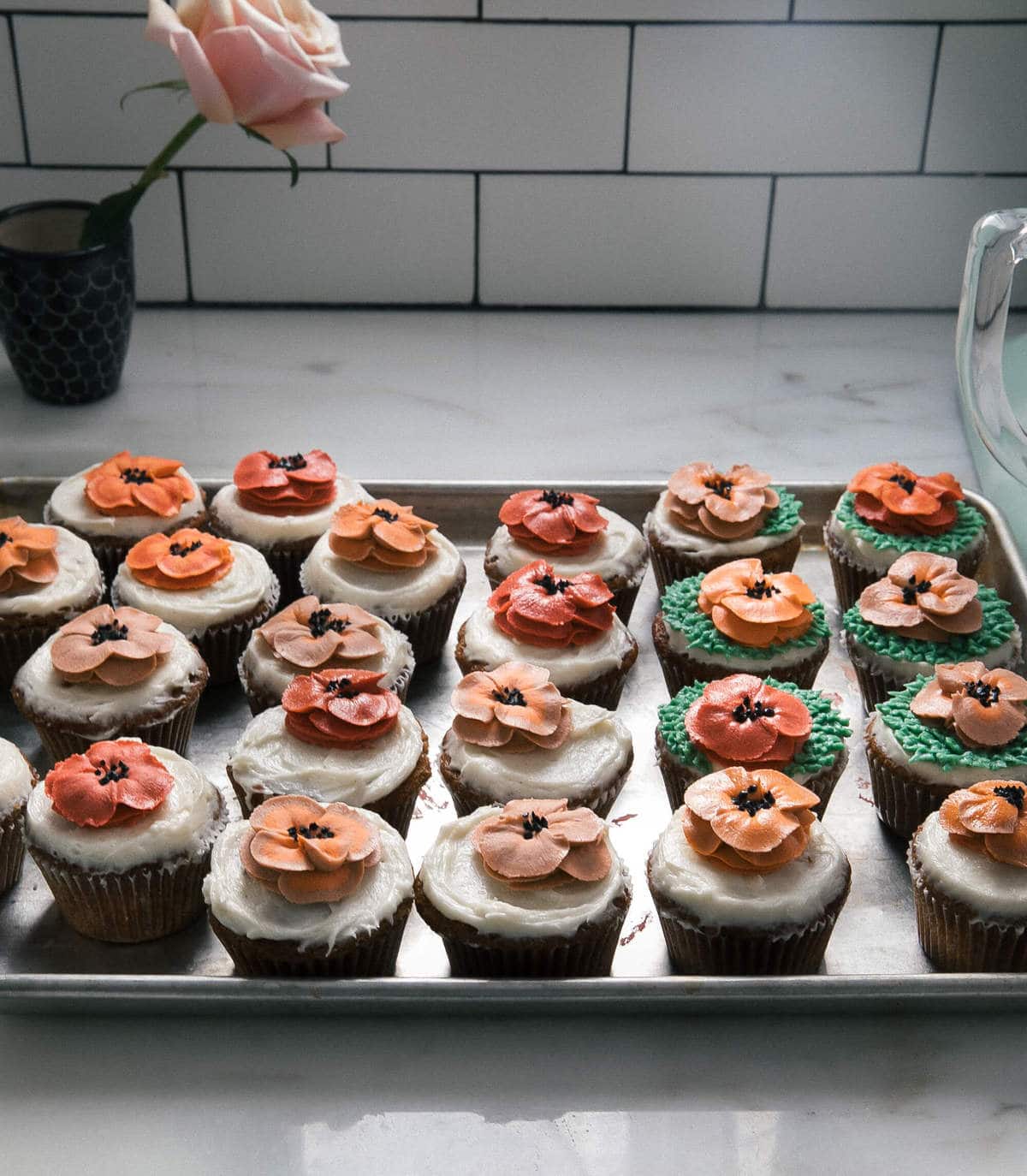 Carrot Cake Cupcakes getting decorated.