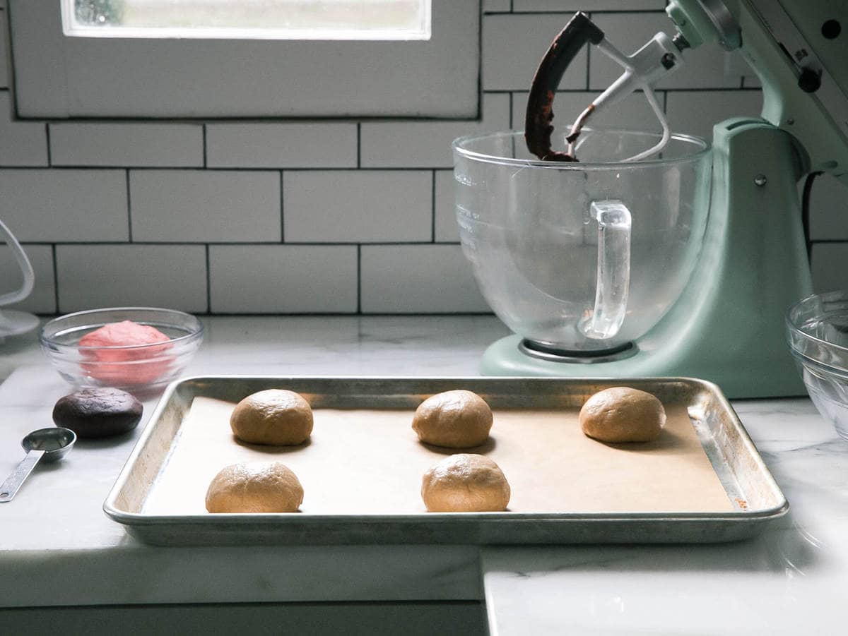 Concha dough formed into balls for their second rise