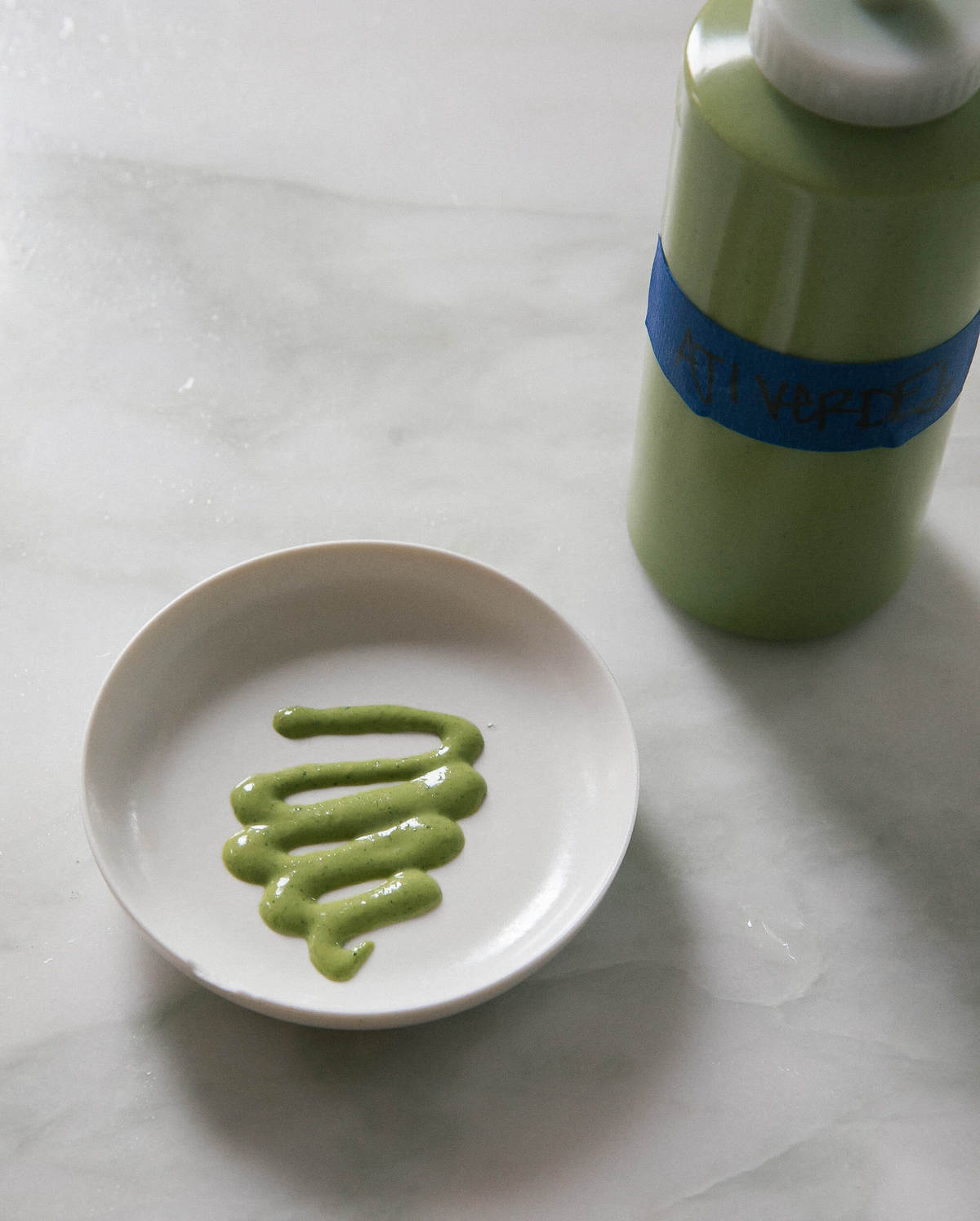 Aji Verde (Peruvian Green Sauce) on a dish. 