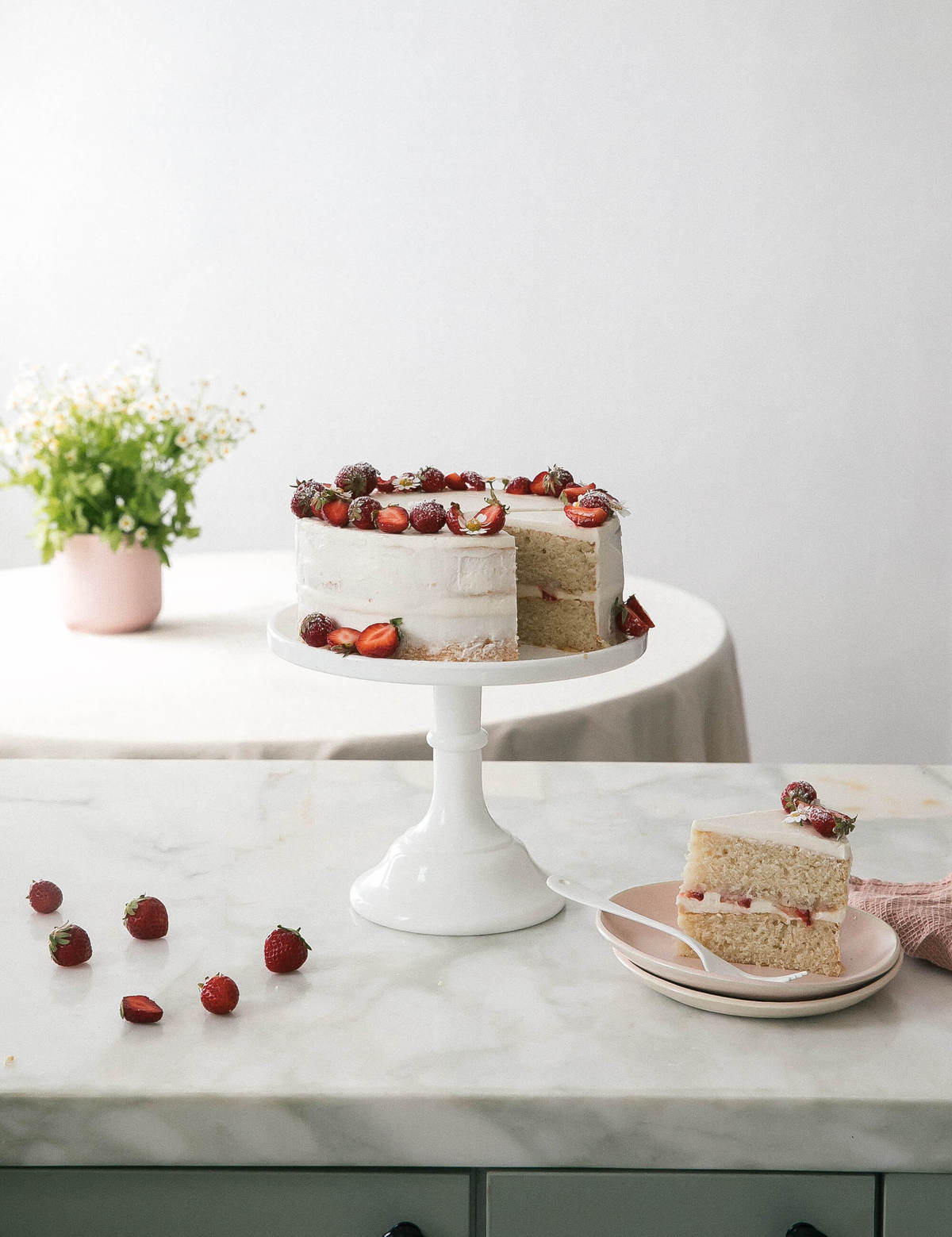 Strawberry Cream Cake decorated on cake stand. 