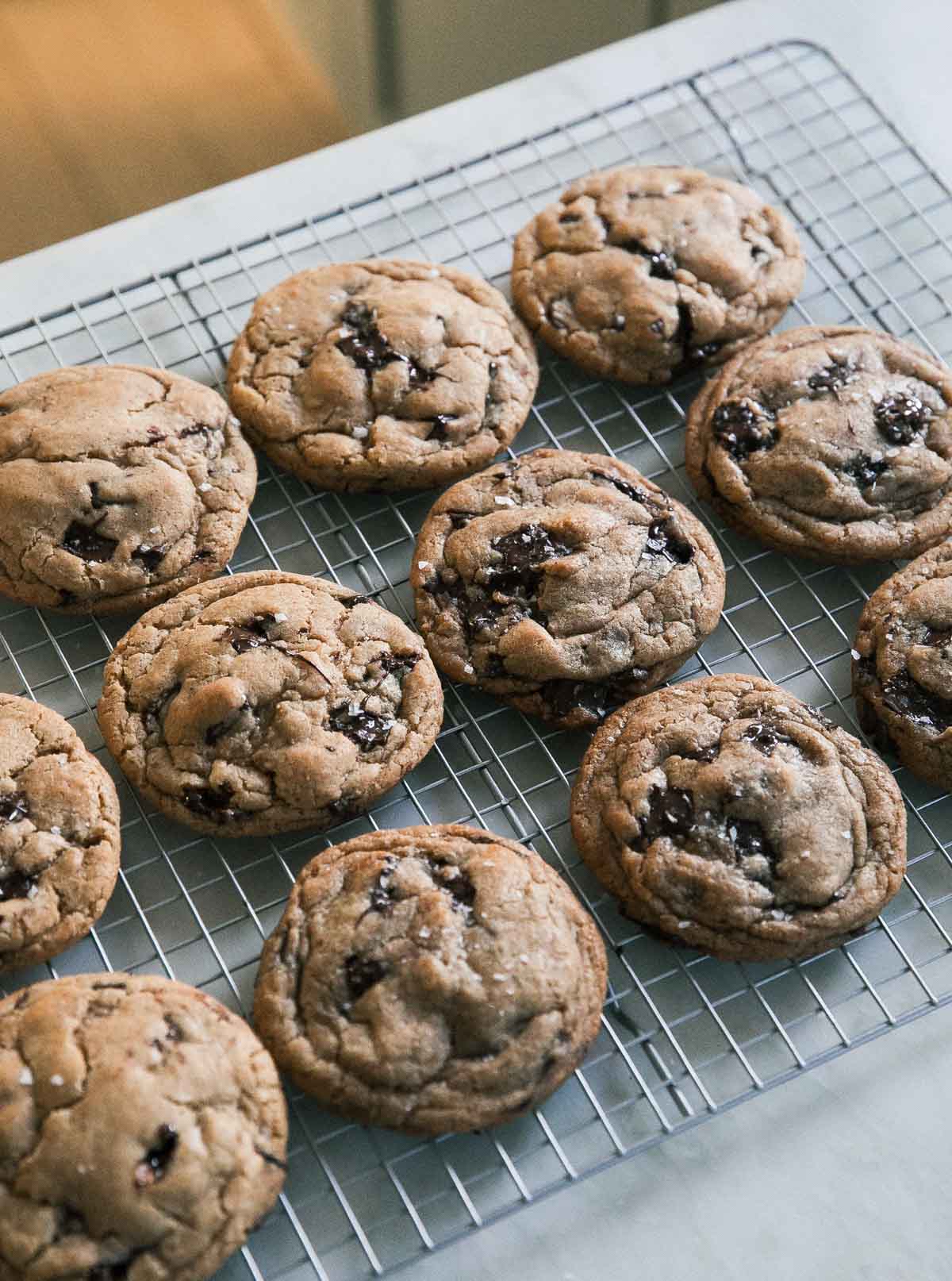 angle of chocolate chip cookies on a cooling rack