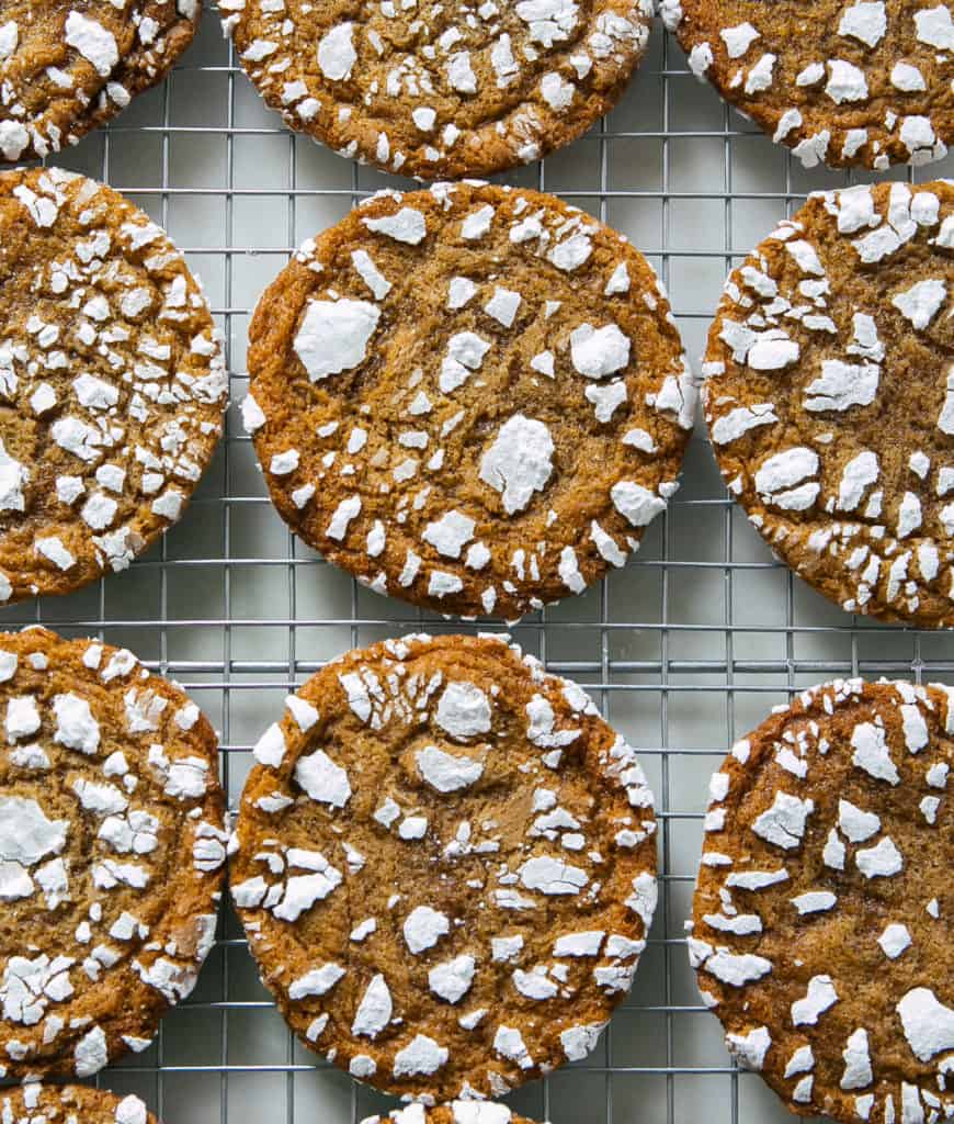 Gingerbread Crinkle Cookies on baking rack. 